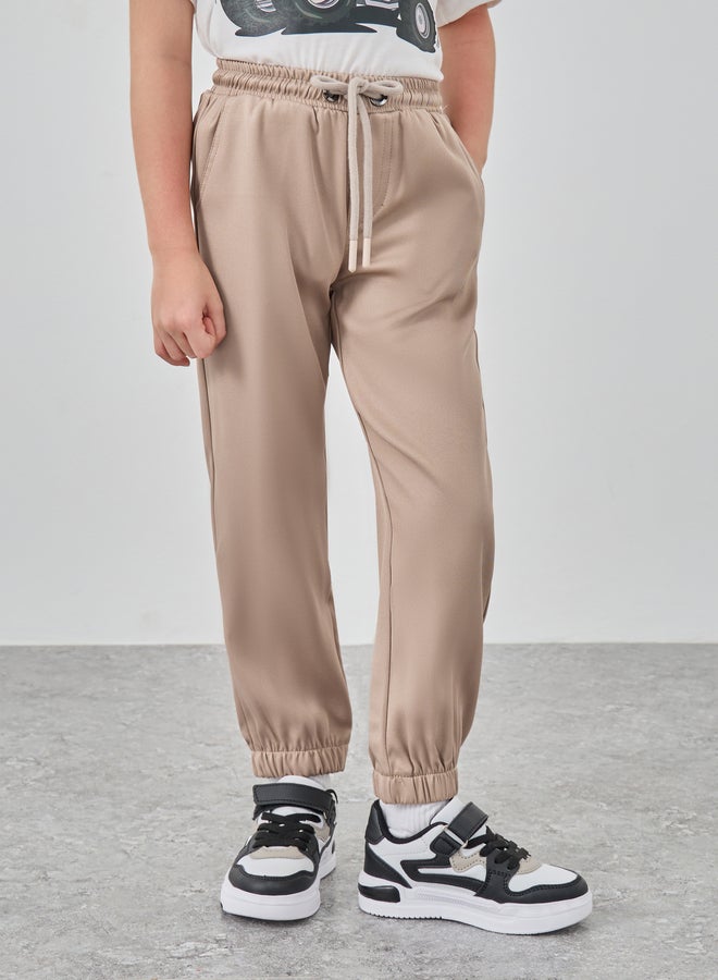 Styli Solid Mid Rise Joggers with Drawstring - Image 1