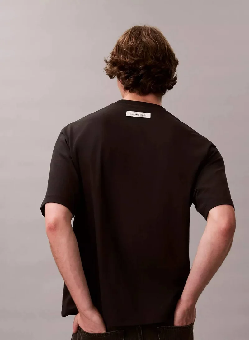 Calvin Klein Black Flocked Logo Graphic Relaxed T-Shirt for Men | Best Price UAE
