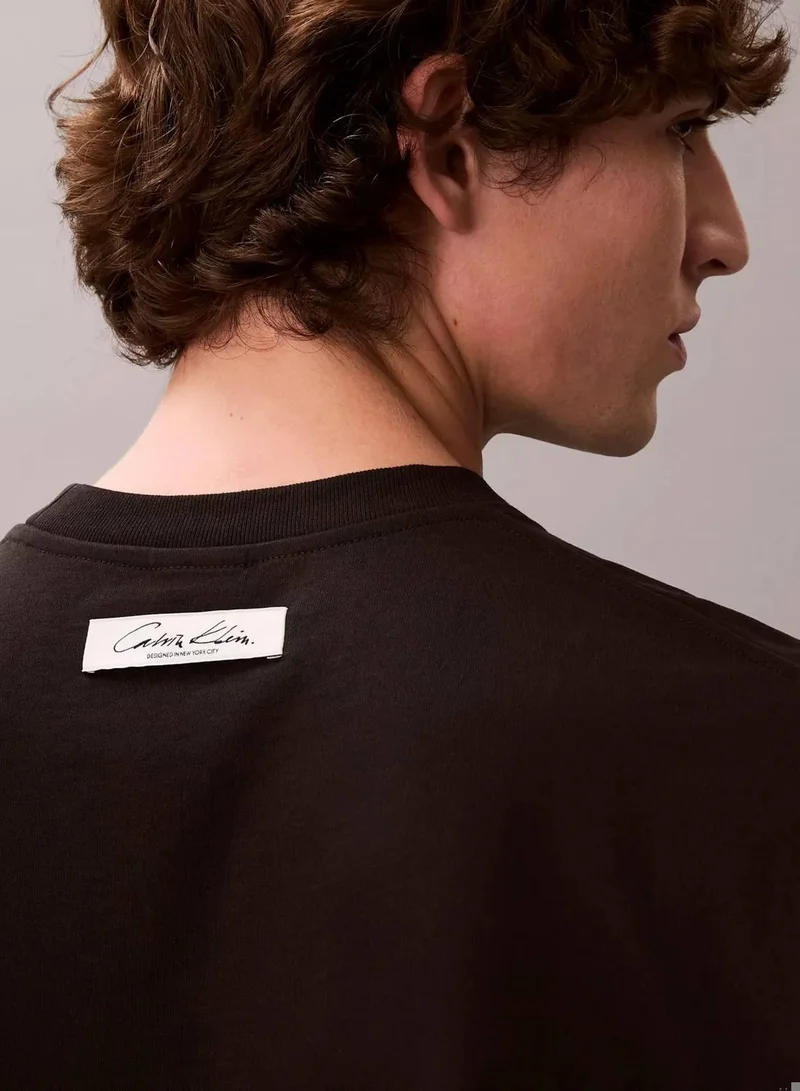 Calvin Klein Black Flocked Logo Graphic Relaxed T-Shirt for Men | Best Price UAE