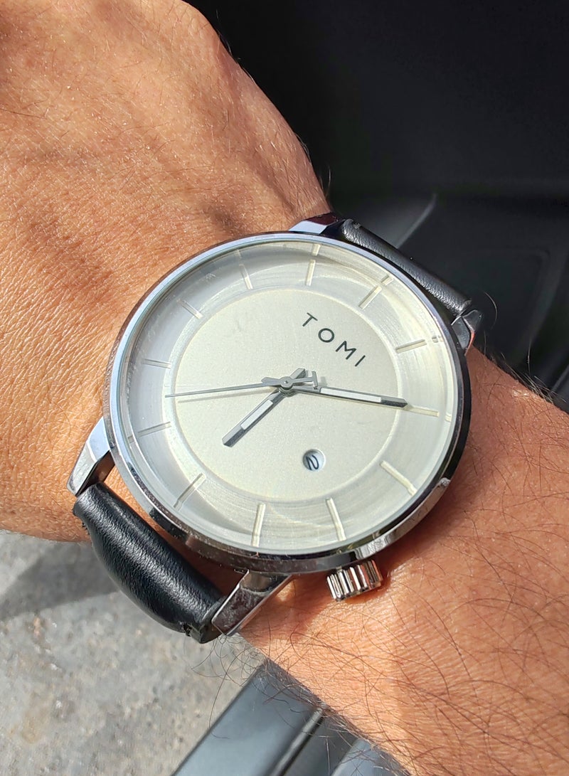 TOMI Watch With a Black Leather Strap With Analog Dials For Both Men And Women, In Addition To Displaying The Date On a Daily Basis - Image 1