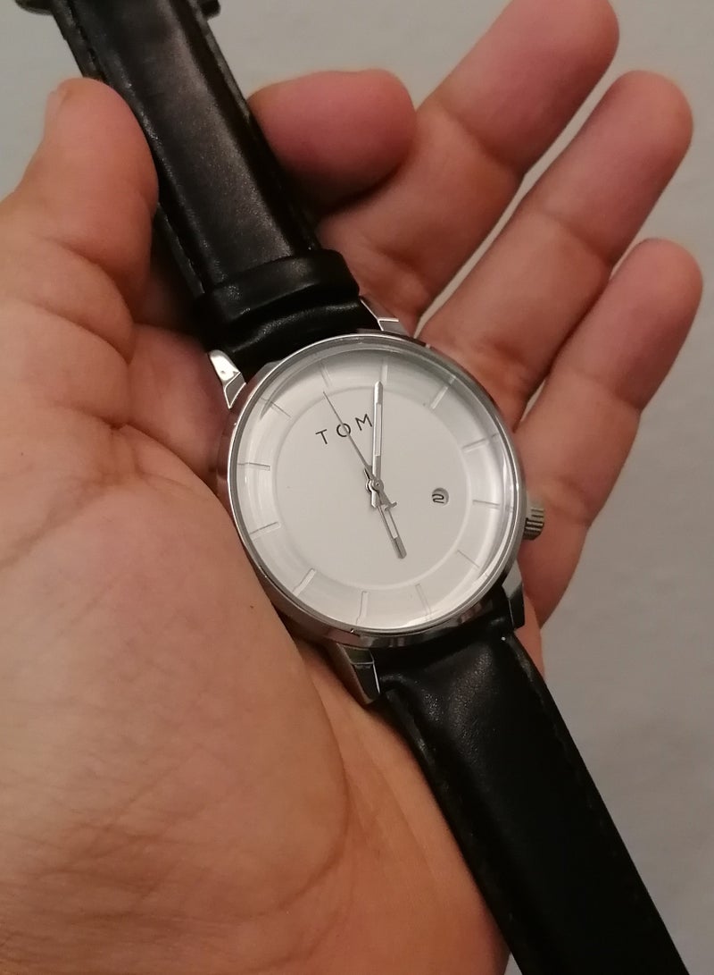 TOMI Watch With a Black Leather Strap With Analog Dials For Both Men And Women, In Addition To Displaying The Date On a Daily Basis - Image 3