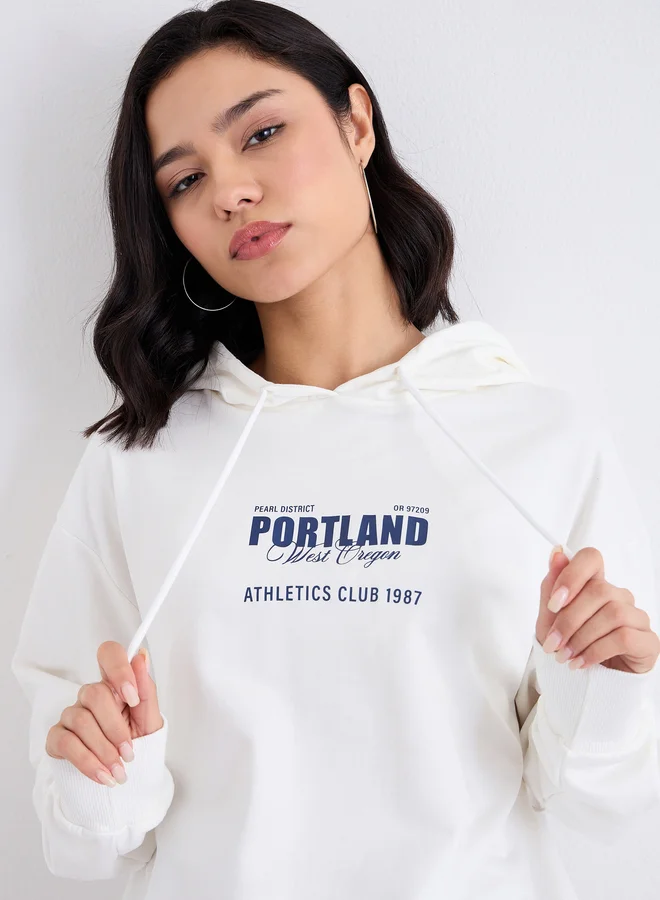 Styli Styli Off White Longline Hoodie with Slogan Print