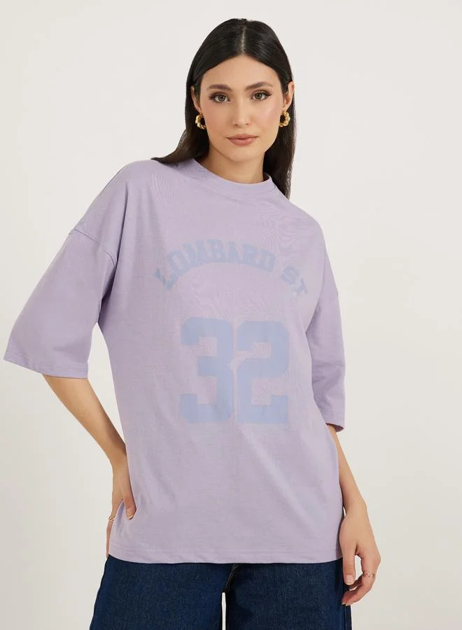 ستايلي Styli Slogan Print Dropped Shoulder Oversized T-Shirt
