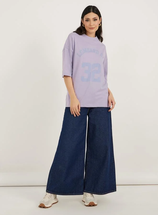 ستايلي Styli Slogan Print Dropped Shoulder Oversized T-Shirt