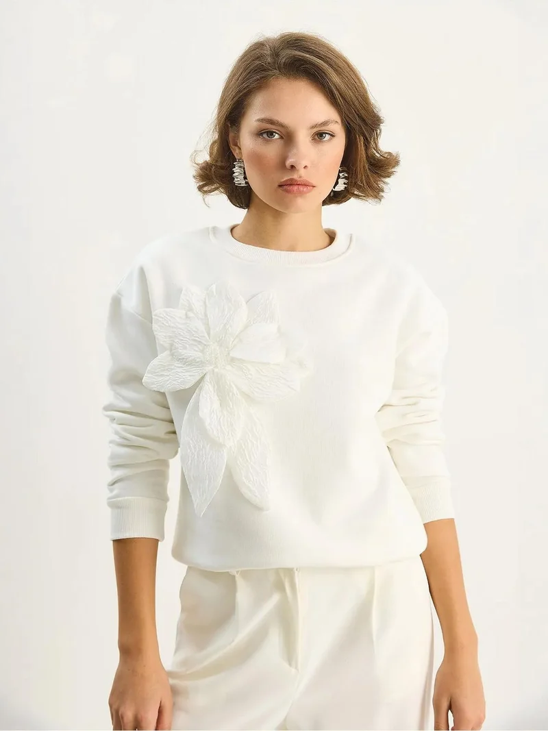 بيانكو لوتشي سويت شيرت بأكمام طويلة وياقة دائرية بتفاصيل لوكسي