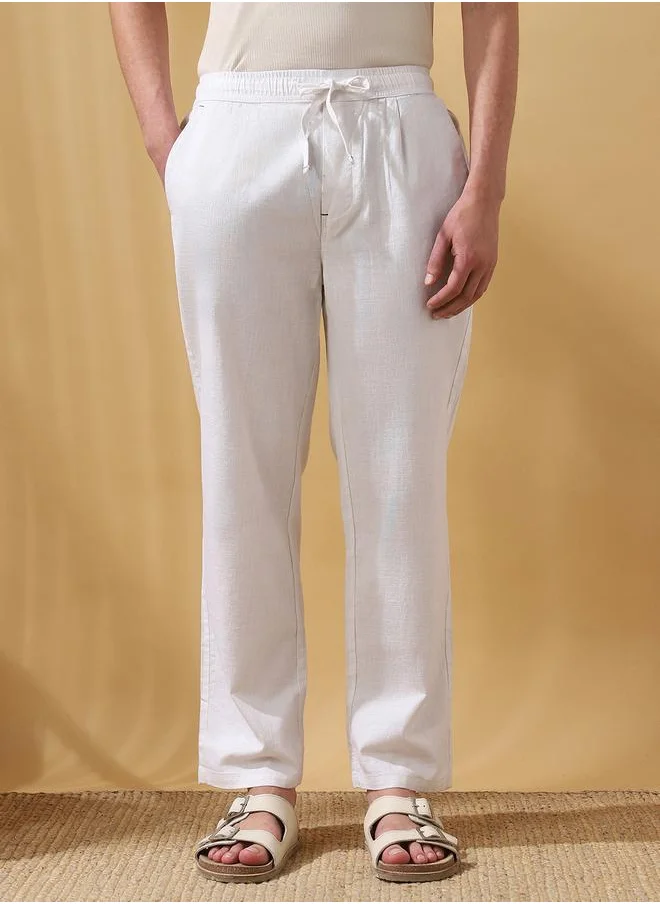 دينيس لينغو White 100% Cotton Slub Solid Pattern Straight Fit Trouser for Men Full Bottom Body Wear Pleat Front Drawstring Closure Woven Weave Mid Rise Waist - Perfect for Lifestyle Occasions