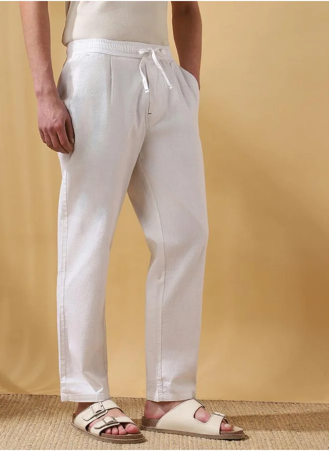 دينيس لينغو White 100% Cotton Slub Solid Pattern Straight Fit Trouser for Men Full Bottom Body Wear Pleat Front Drawstring Closure Woven Weave Mid Rise Waist - Perfect for Lifestyle Occasions