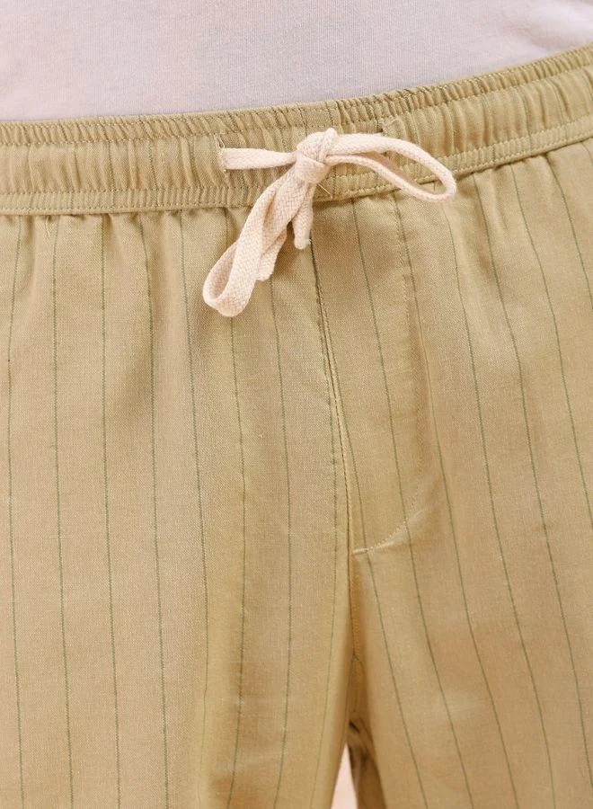 The Indian Garage Co  The Indian Garage Co Men Relaxed Cropped Vertical Striped Mid-Rise Trousers for Men | Best Price UAE