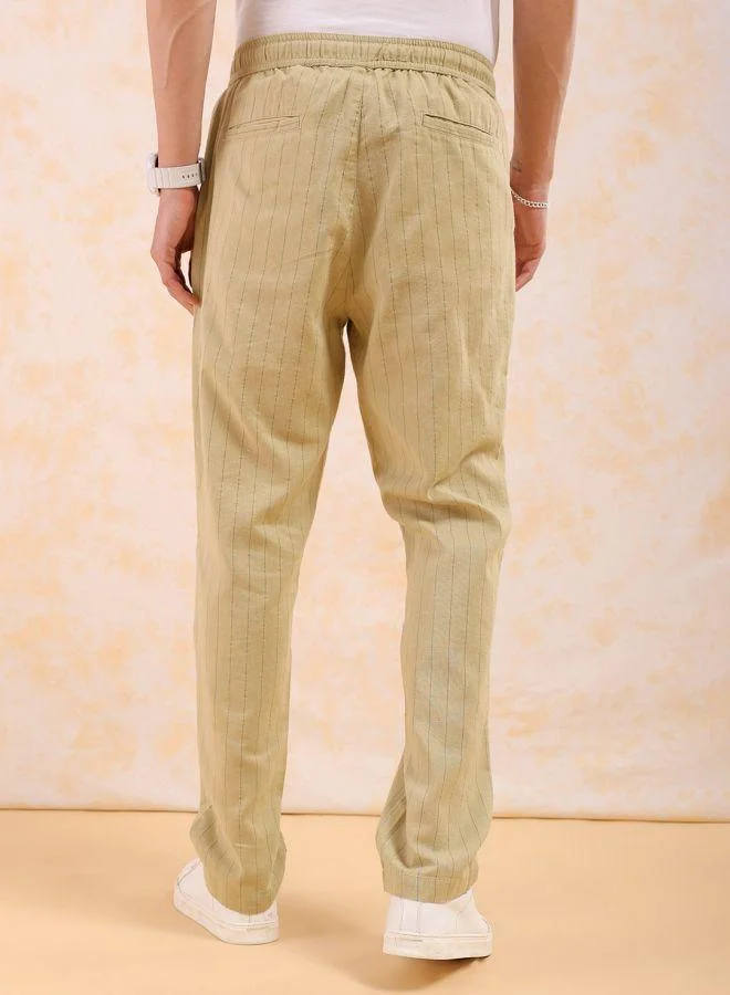 The Indian Garage Co  The Indian Garage Co Men Relaxed Cropped Vertical Striped Mid-Rise Trousers for Men | Best Price UAE