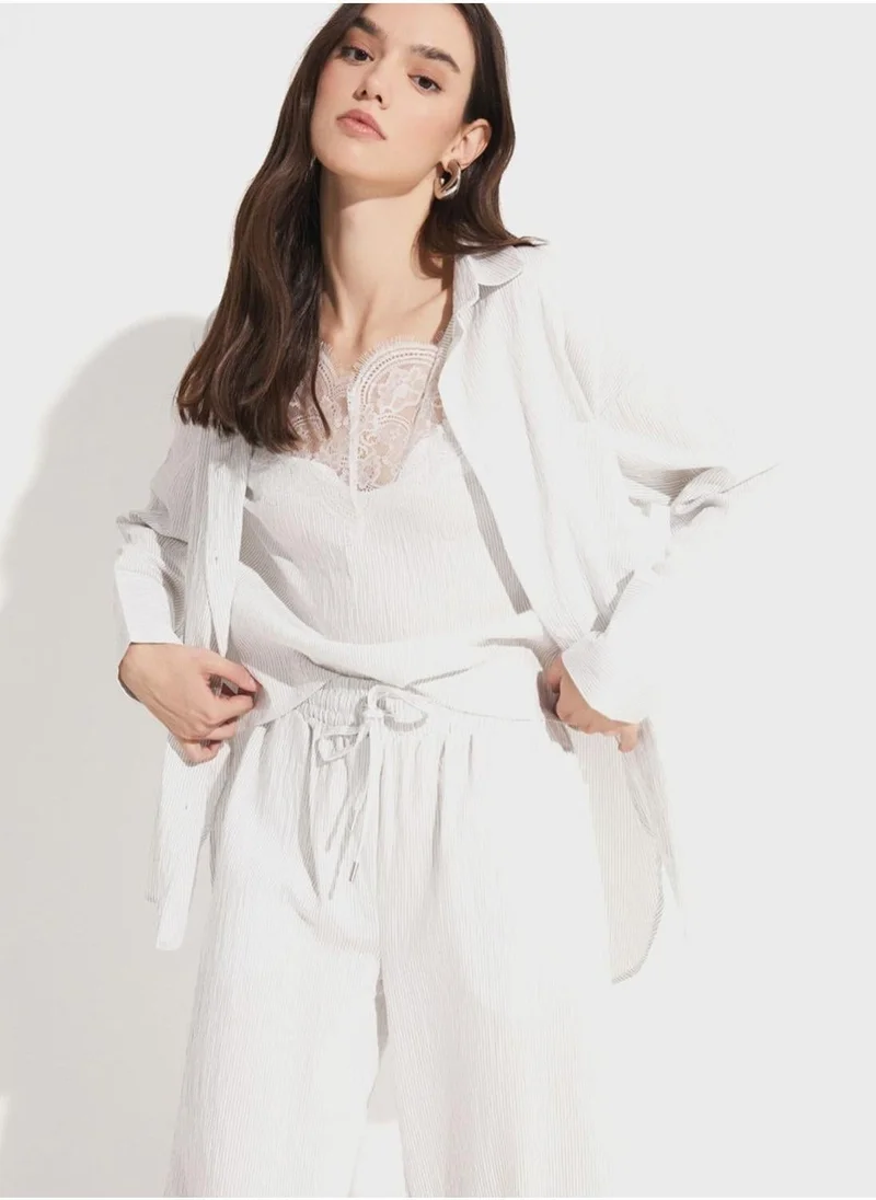 جون زر قميص أسفل