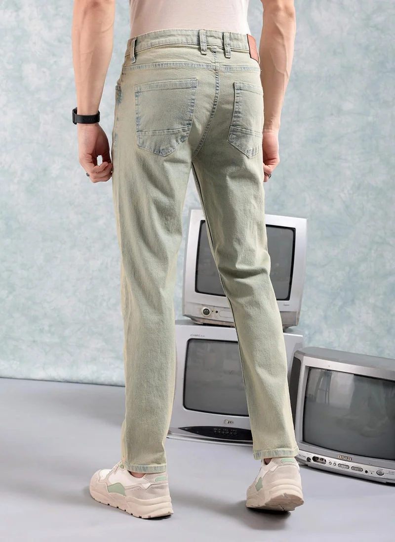 ذا انديان كراج كو Men Slim Fit Solid Mid-Rise Stretchable Jeans