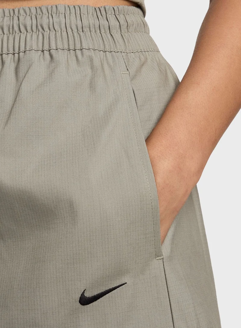 Nike Nsw Essential Woven Midrise Cargo Middi Skirt
