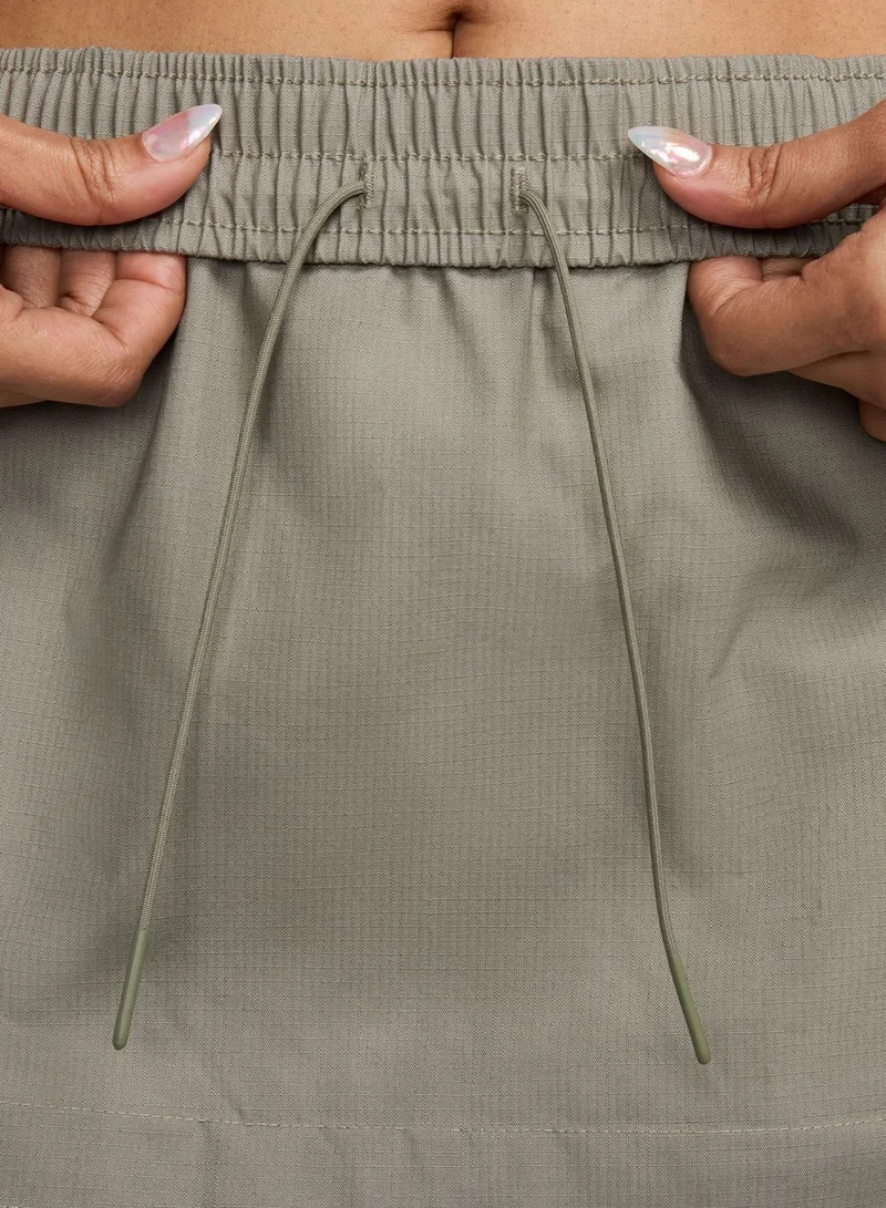 Nike Nsw Essential Woven Midrise Cargo Middi Skirt