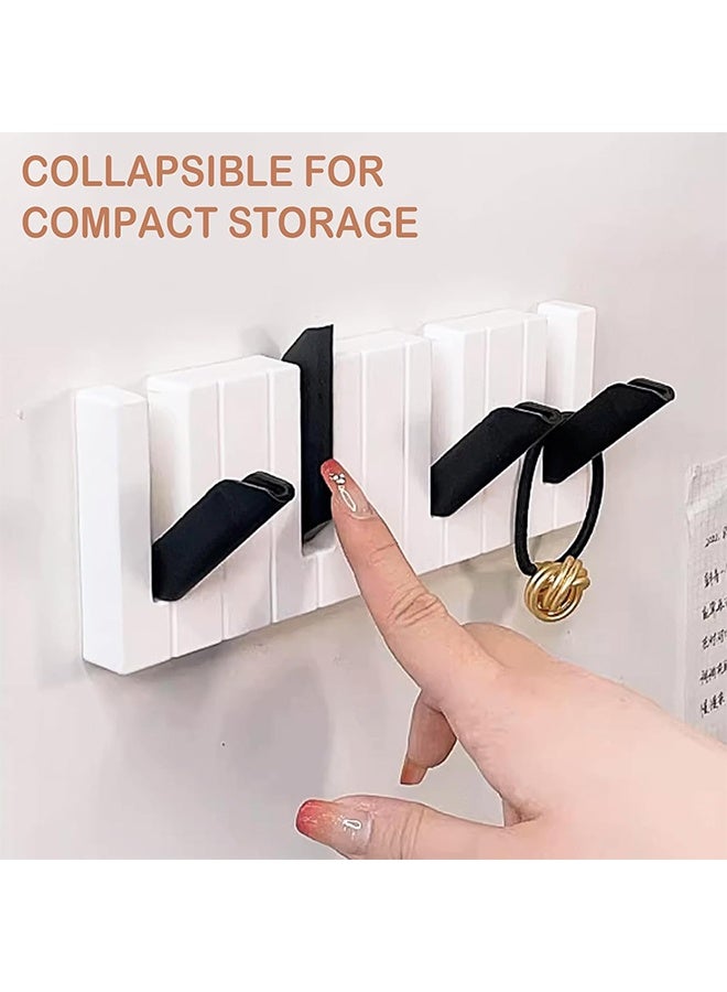 رف معاطف مثبت على الحائط بشكل يشبه البيانو بدون الحاجة للحفر مع 4 خطاطيف مخفية قابلة للطي، لتوفير المساحة لتعليق القبعات والملابس والحقائب والمفاتيح. (أسود وأبيض) - Image 4