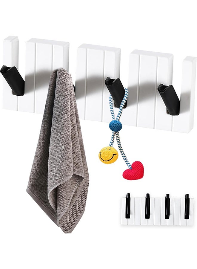 رف معاطف مثبت على الحائط بشكل يشبه البيانو بدون الحاجة للحفر مع 4 خطاطيف مخفية قابلة للطي، لتوفير المساحة لتعليق القبعات والملابس والحقائب والمفاتيح. (أسود وأبيض) - Image 1