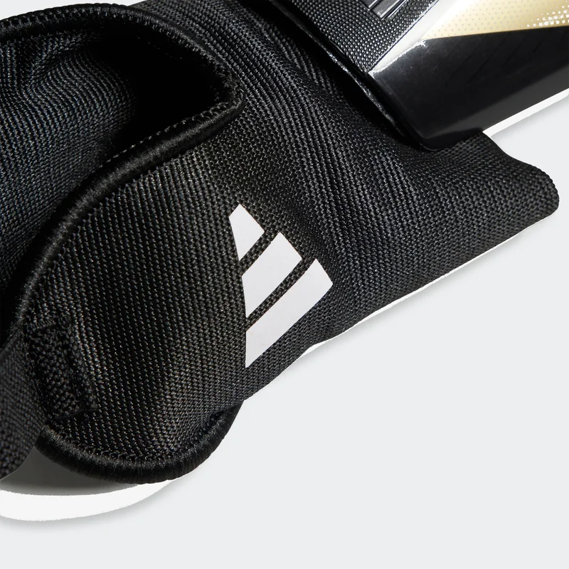 Adidas Black / Gold Metallic / White Tiro Match Shin Guards  | Best Price UAE