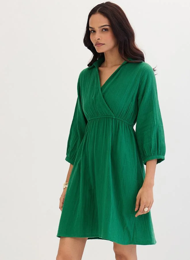 Femmella  Femmella Green Open Collar Wrap Front Mini Dress for Women | Best Price UAE