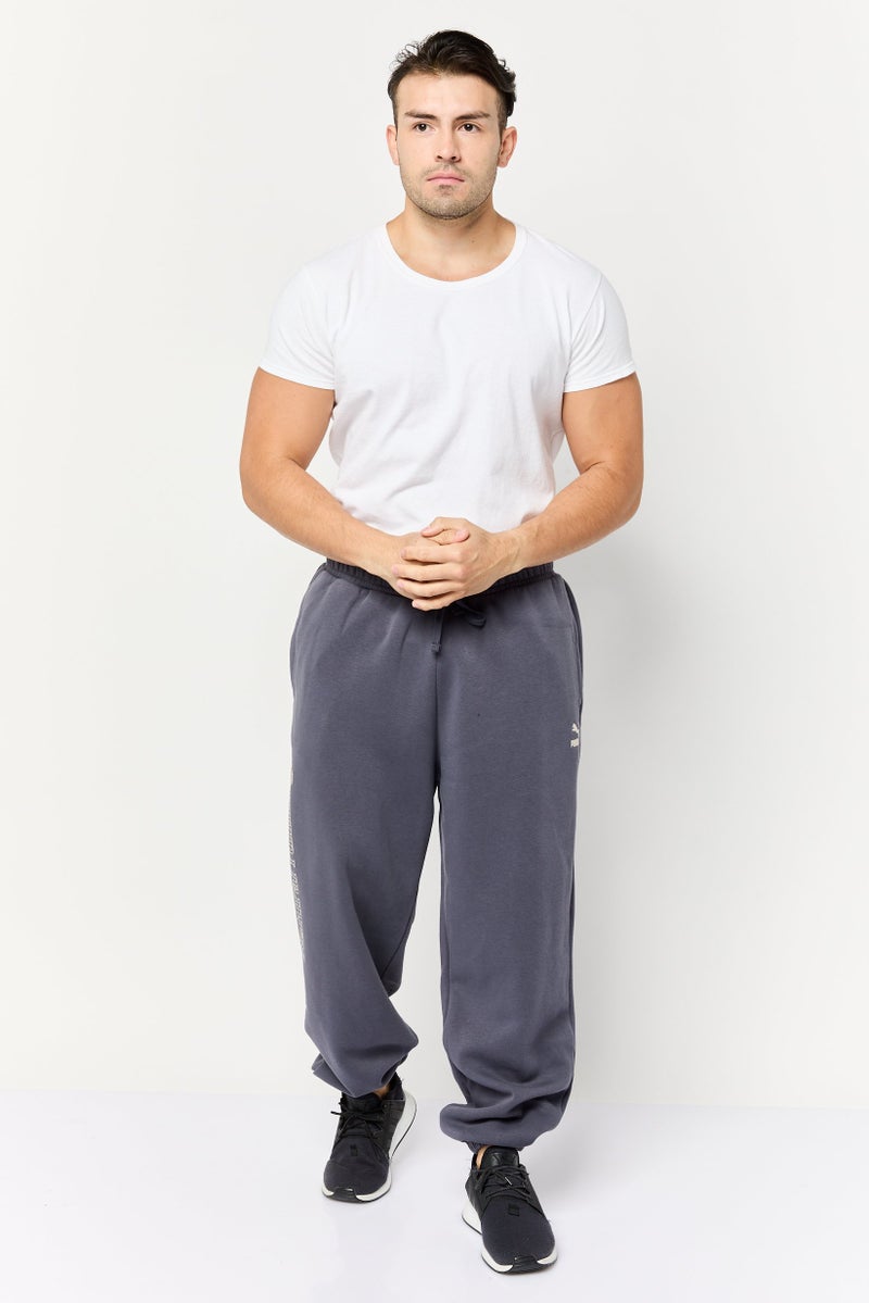 PUMA سروال رياضي للرجال بقصة مريحة، رمادي - Image 2