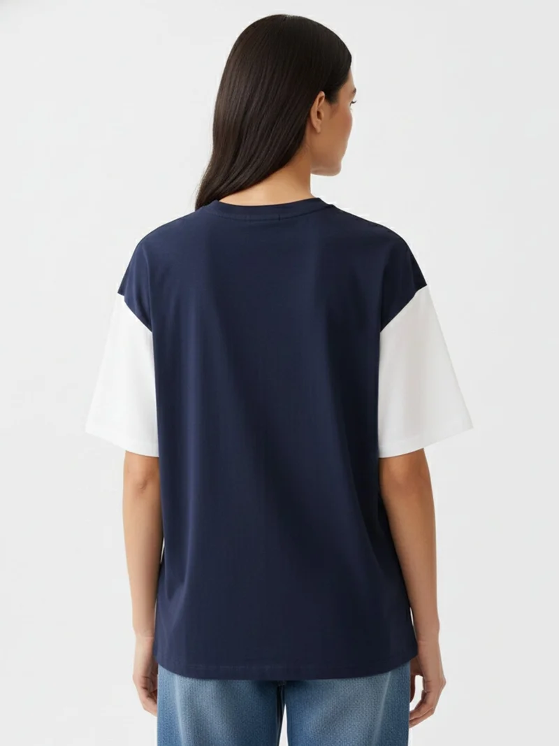 Outzidr white Navy Blue Oversized T-Shirt With Graphic And Cut & Sew Highlights for Women | Best Price UAE