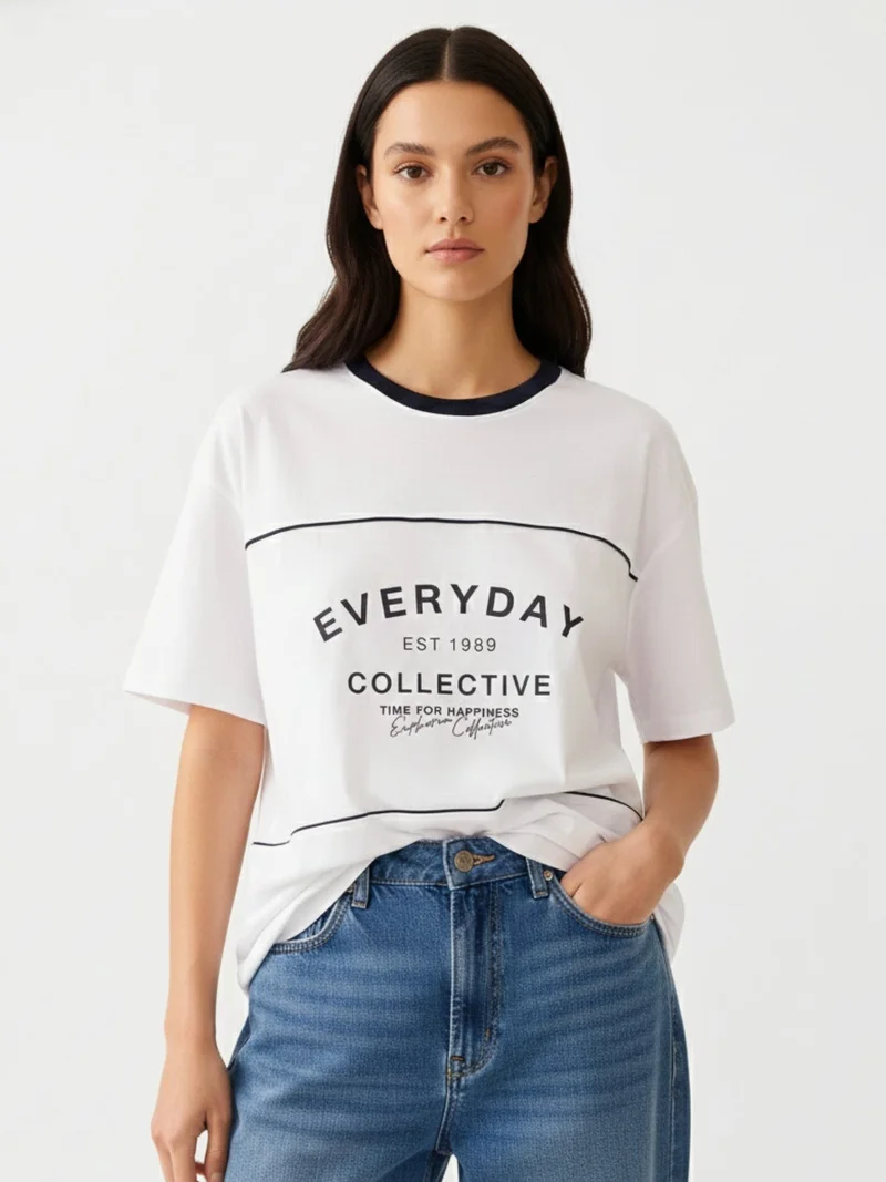 Outzidr white Navy Blue Oversized T-Shirt With Graphic And Cut & Sew Highlights for Women | Best Price UAE