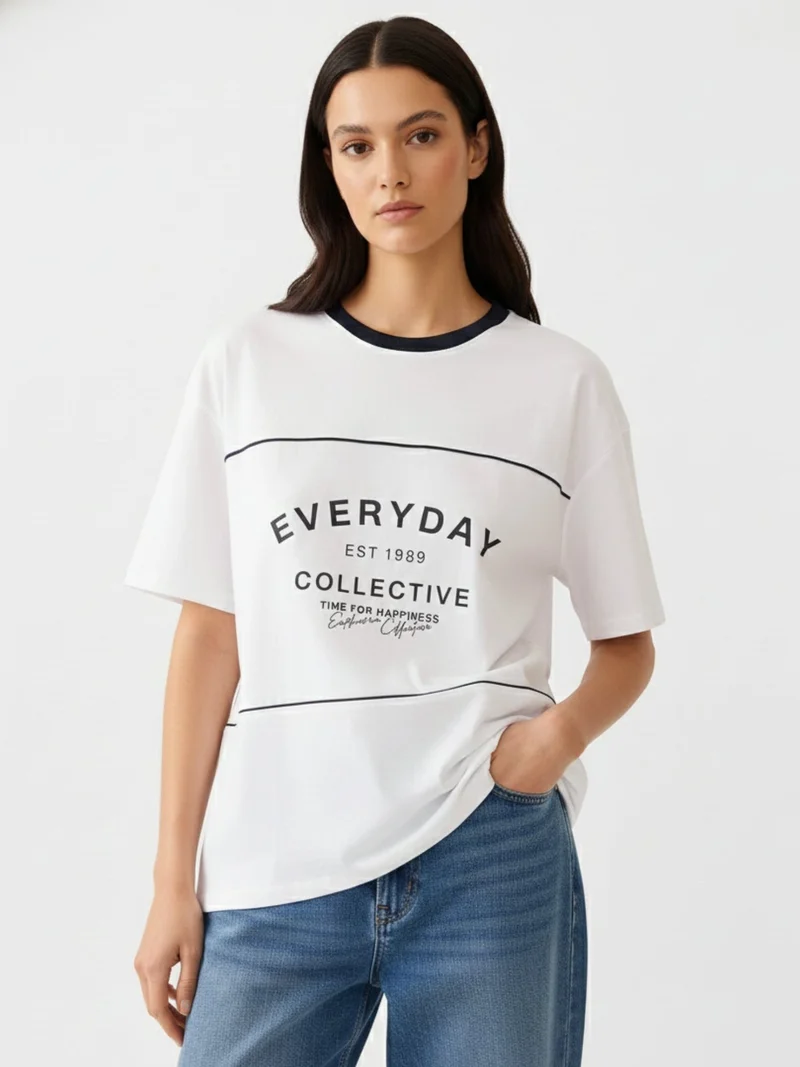 Outzidr white Navy Blue Oversized T-Shirt With Graphic And Cut & Sew Highlights for Women | Best Price UAE