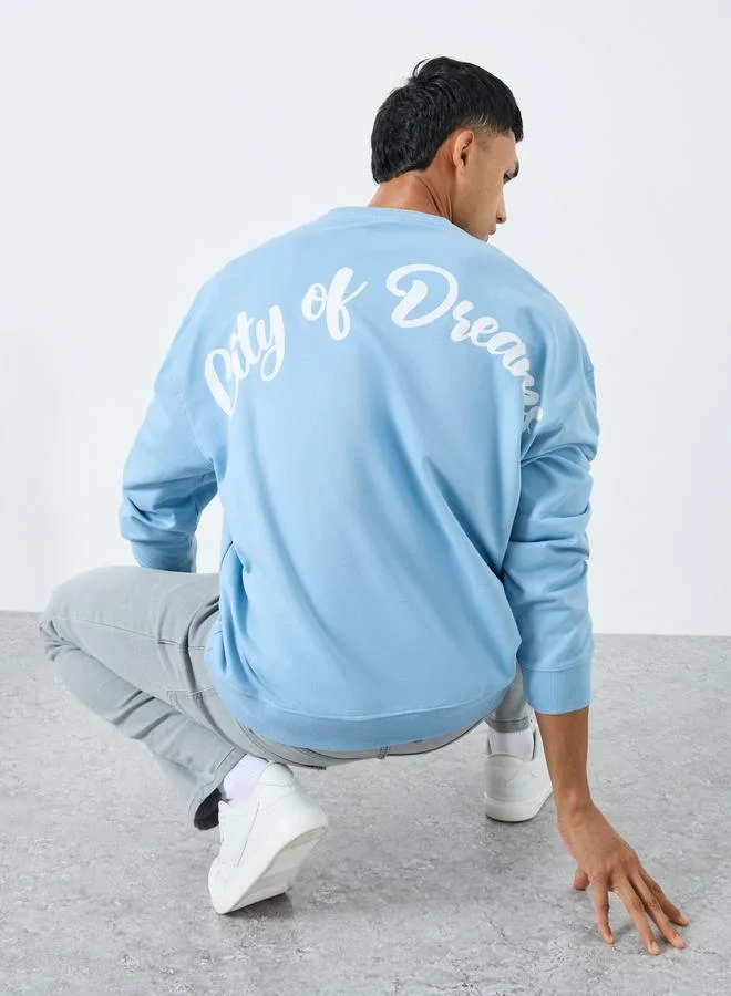 Styli Men Blue Graphic Print Oversized T-Shirt