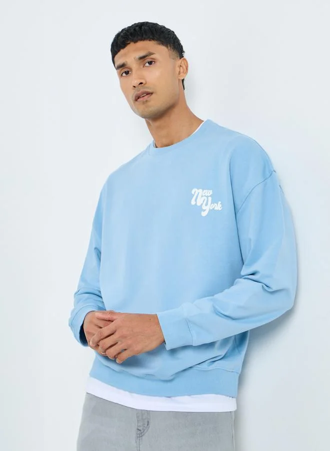 ستايلي تيشيرت واسع بطبعة جرافيك