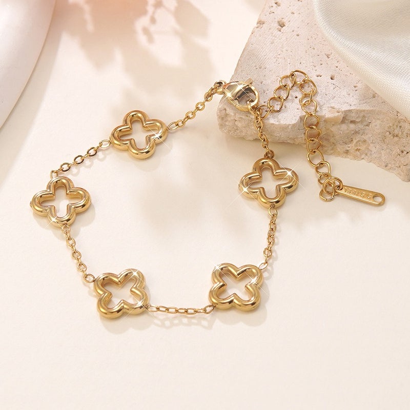 Luxury Stainless Steel Four-Leaf Clover Bracelet with 18K Gold Plating and Zirconia - Elegant, Versatile, and Trendy