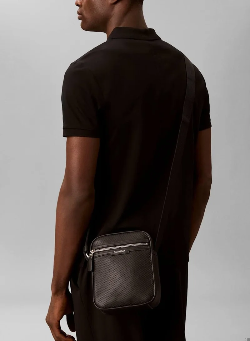 Calvin Klein Black Perforated Faux Leather Reporter Bag for Men | Best Price UAE