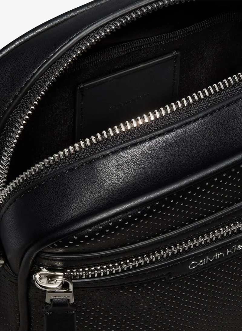 Calvin Klein Black Perforated Faux Leather Reporter Bag for Men | Best Price UAE