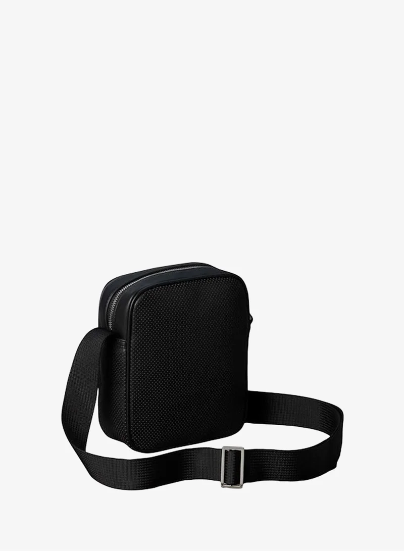 Calvin Klein Black Perforated Faux Leather Reporter Bag for Men | Best Price UAE