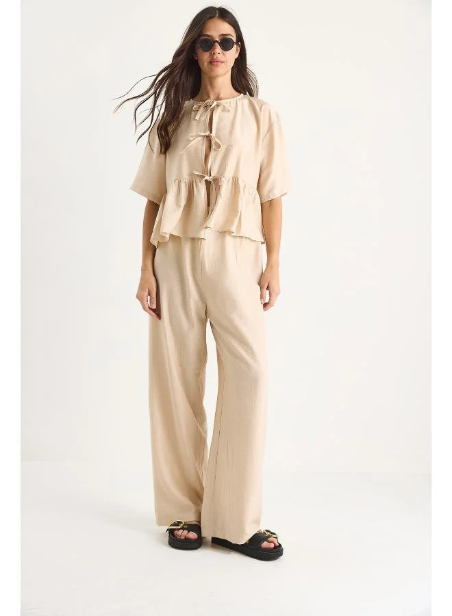 Ginger  Tie Up Peplum Top & Pant Coord Set for Women | Best Price UAE