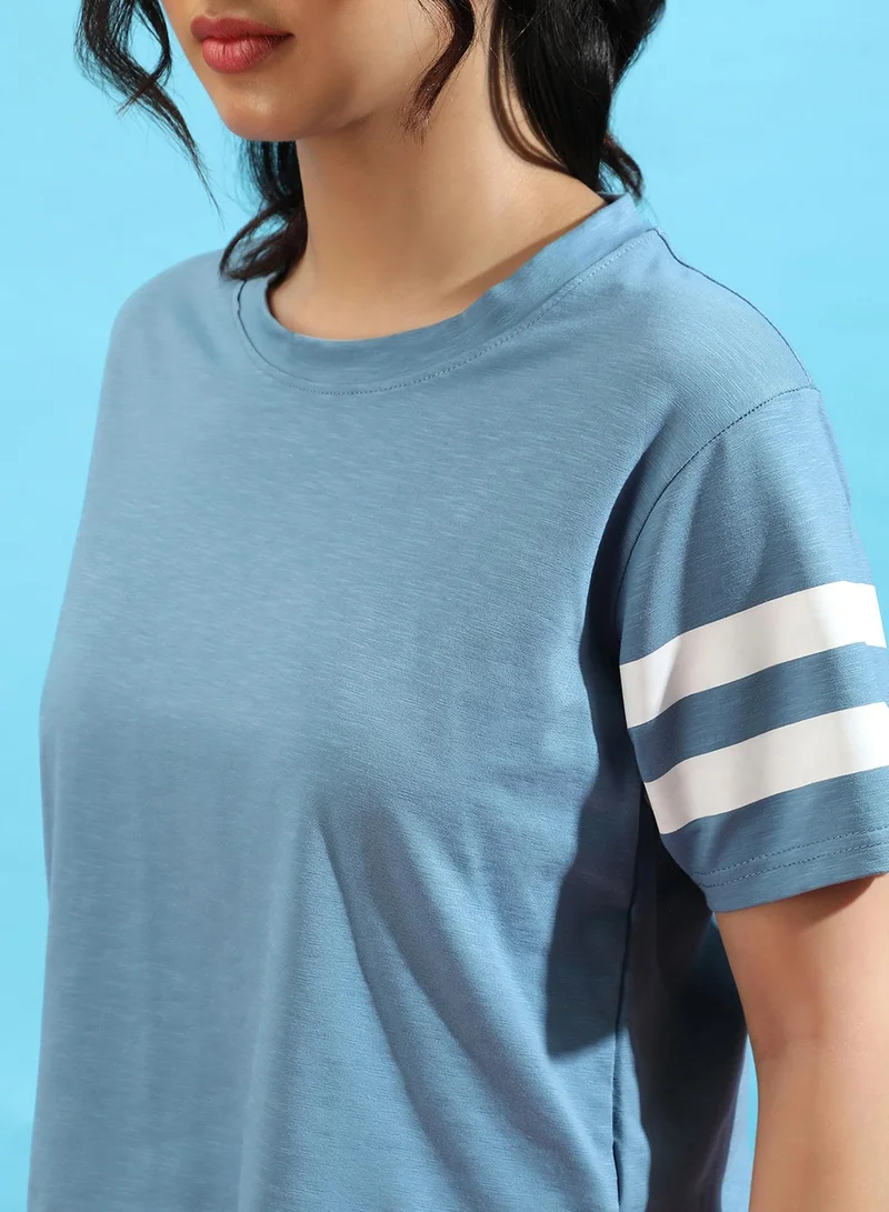 كامبوس سوترا Campus Sutra Women's Solid Light Blue Boxy Top For Casual Wear | Crew Neck | Short Sleeve | Poly Cotton Top Crafted With Regular Sleeve & Comfort Fit For Everyday Wear