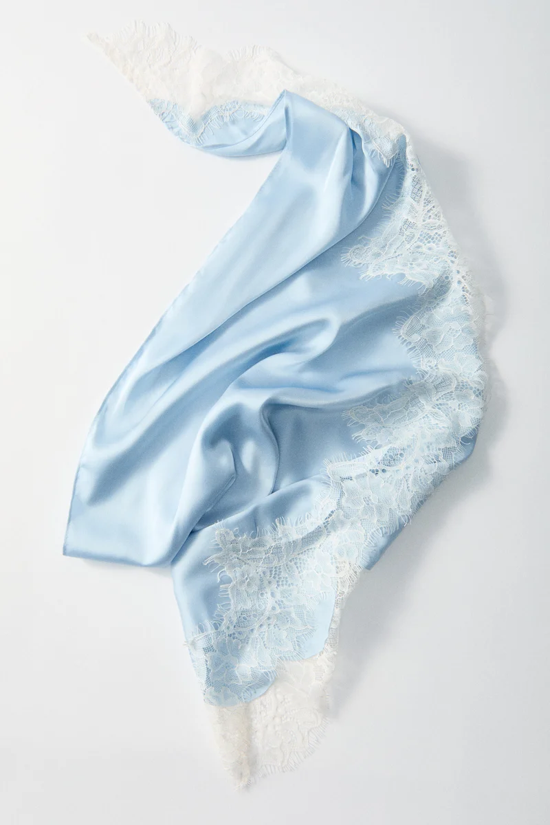 Lace-trimmed triangle scarf