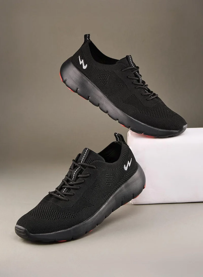 كامبس أحذية رياضية رجالية سوداء بإطلالة جريئة أحادية اللون تعزز الأناقة الكاجوال