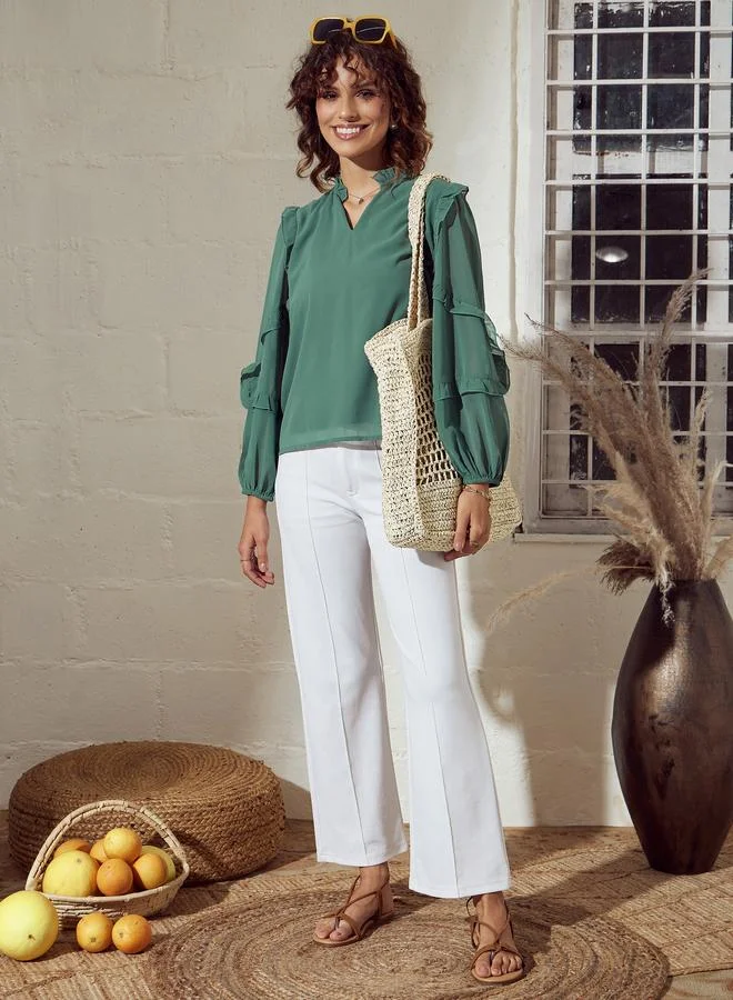 ساسافراس بلوزة سادة بكشكشة