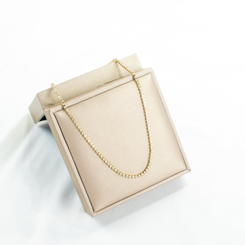 سلسلة تنس أستانليس ستيل ذهبي مرصع بفصوص الزيركون