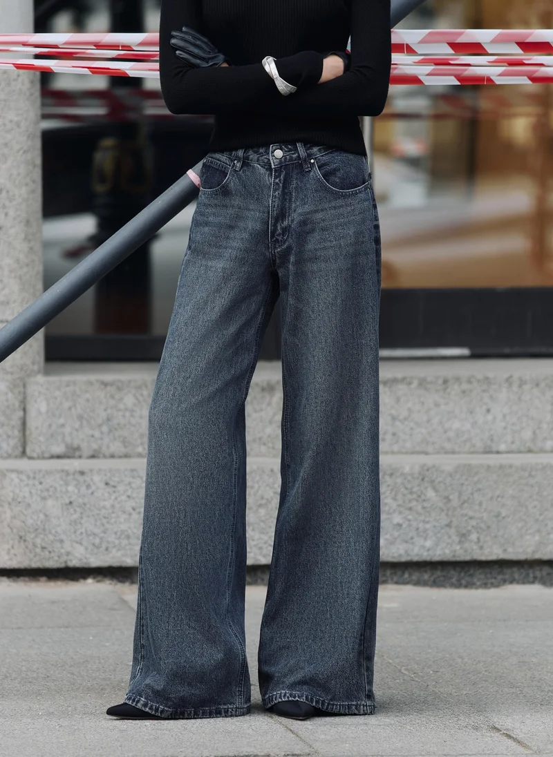 Loose light-wash denim jeans