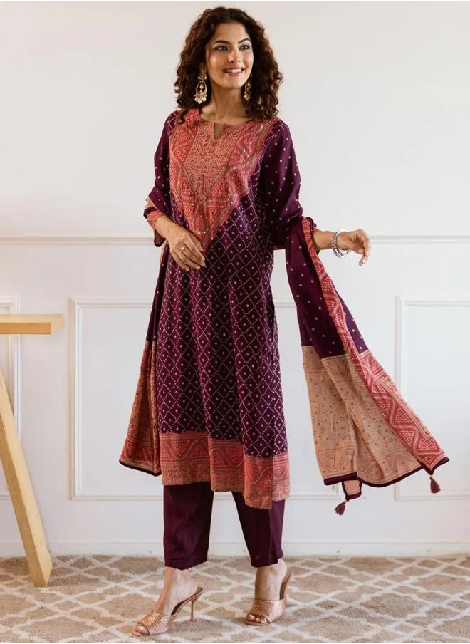 آي شين Mid Rise Women Wine Muslin Kurta Set with Embroidered pattern Tunic and Palazzo features a Round neckline and Three-Fourth Sleeve secured with Elastic closure and styled in Straight Fit ideal for Festive moments — crafted to elevate your special moments.
