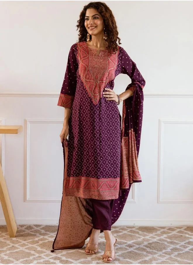 آي شين Mid Rise Women Wine Muslin Kurta Set with Embroidered pattern Tunic and Palazzo features a Round neckline and Three-Fourth Sleeve secured with Elastic closure and styled in Straight Fit ideal for Festive moments — crafted to elevate your special moments.