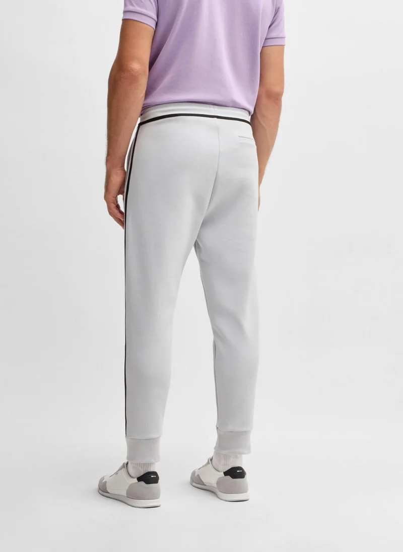 بوس Cotton-blend tracksuit bottoms with tape and logo