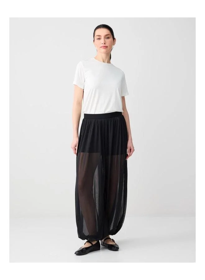 Jimmy Key Black Comfortable Cut Regular Waist Elastic Cuff Mesh Pants.
