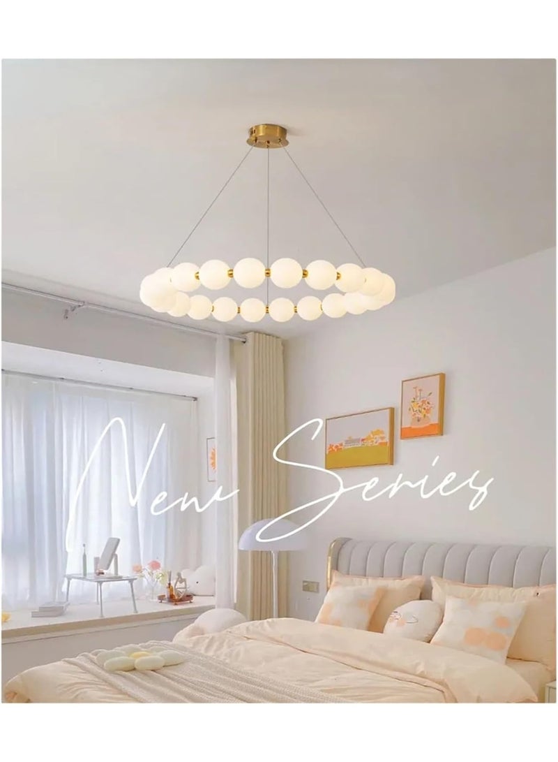 Modern circular ceiling chandelier in gold with illuminated milky glass balls. - Image 2