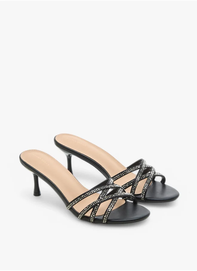 فلورا بيلا من شو إكسبرس Embellished Cross-Strap Sandals with Flared Heel