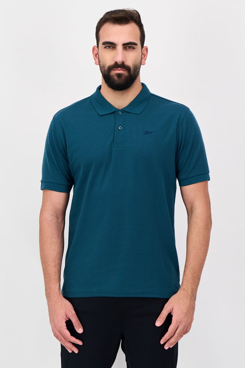 Reebok Men Sportswear Fit Short Sleeve Outdoor Polo Shirt, Green - Image 1