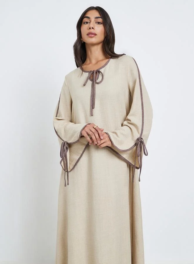 Amirah Amirah Beige Tie-Up Detail Jalabiya with Contrast Piping
