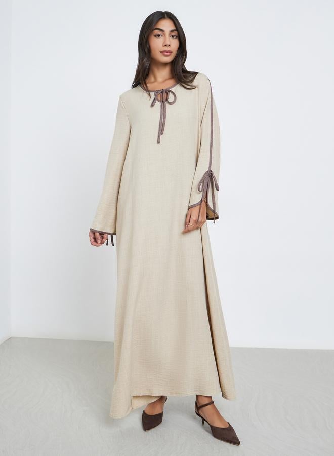 Amirah Beige Tie-Up Detail Jalabiya with Contrast Piping - Image 1