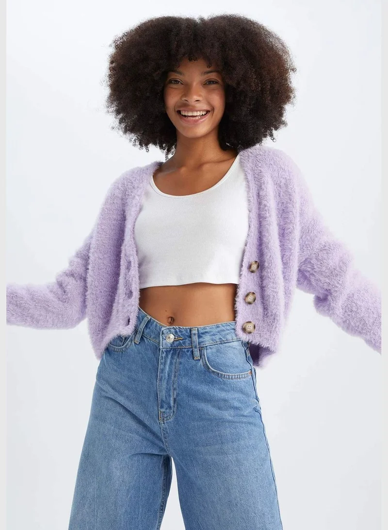 ديفاكتو Oversize V-Neck Buttoned Crop Cardigan