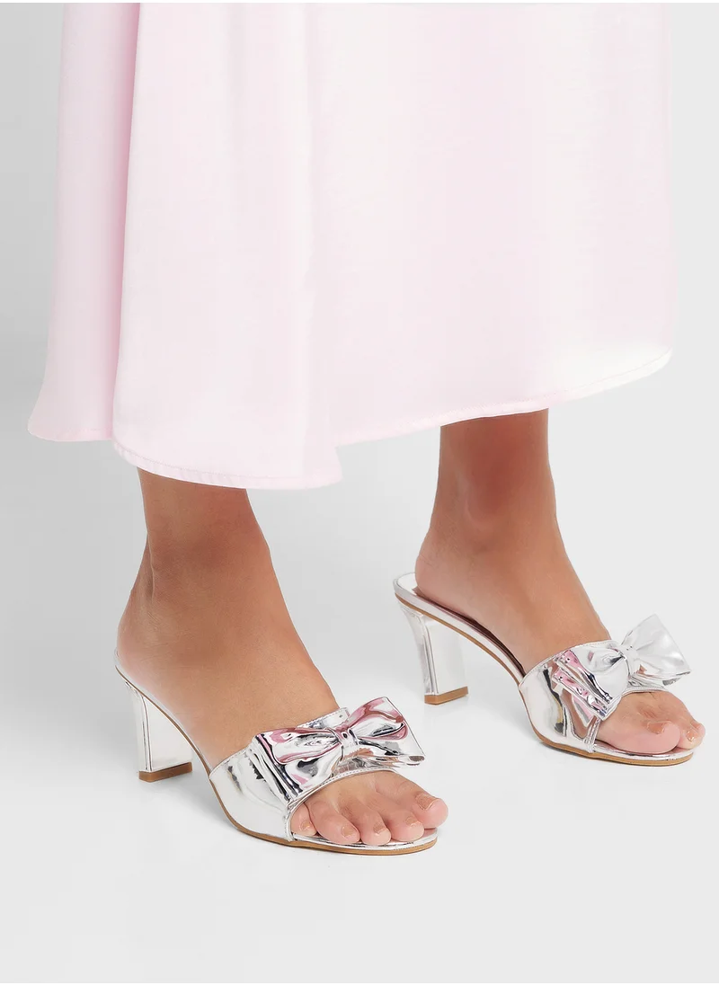 جينجر Oversized Bow Mule Heel Sandal