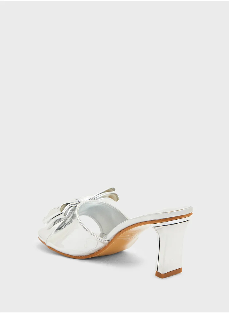 جينجر Oversized Bow Mule Heel Sandal